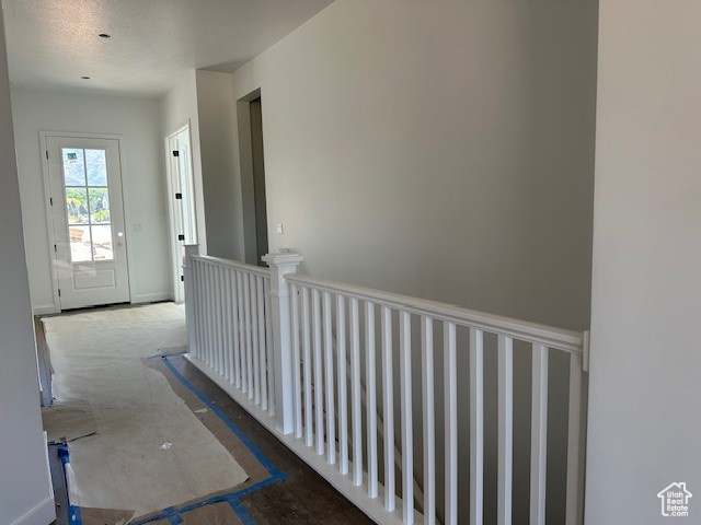 Corridor with an upstairs landing