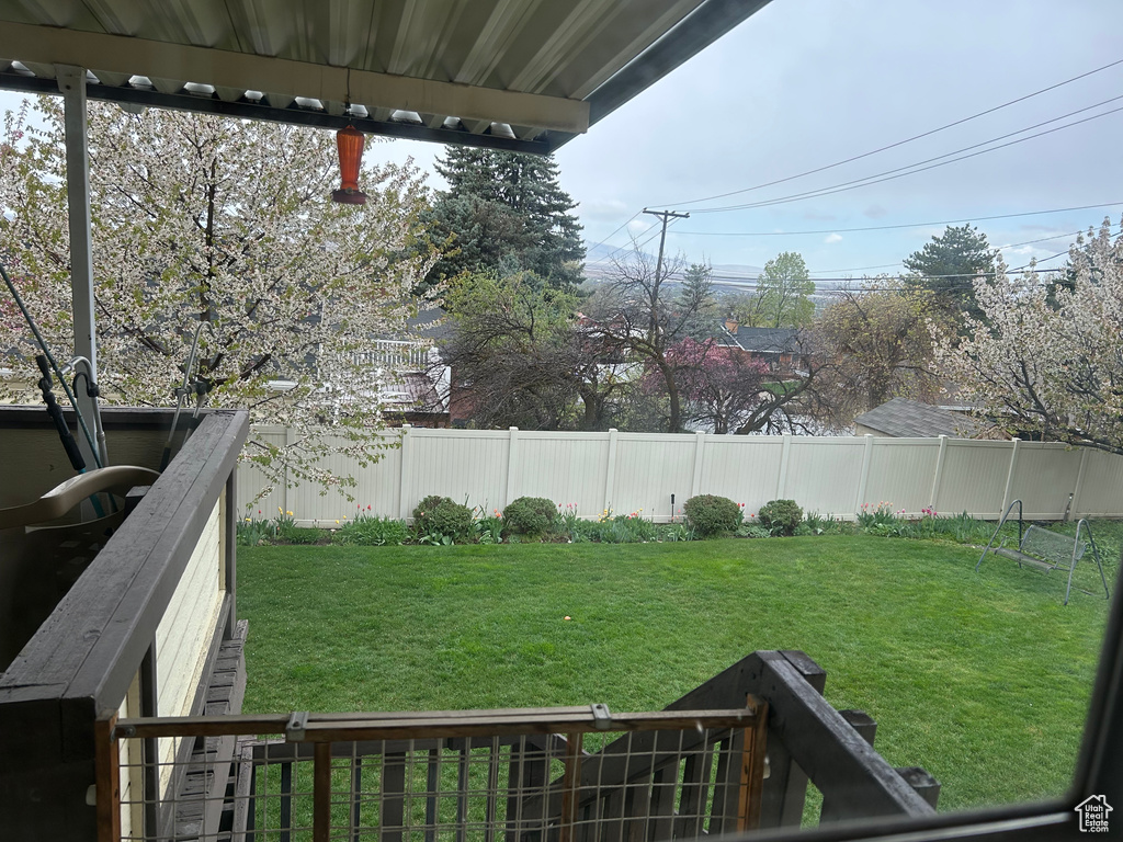 View of yard with a fenced backyard