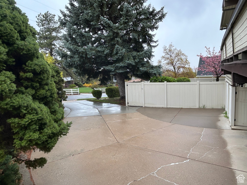 View of patio with fence