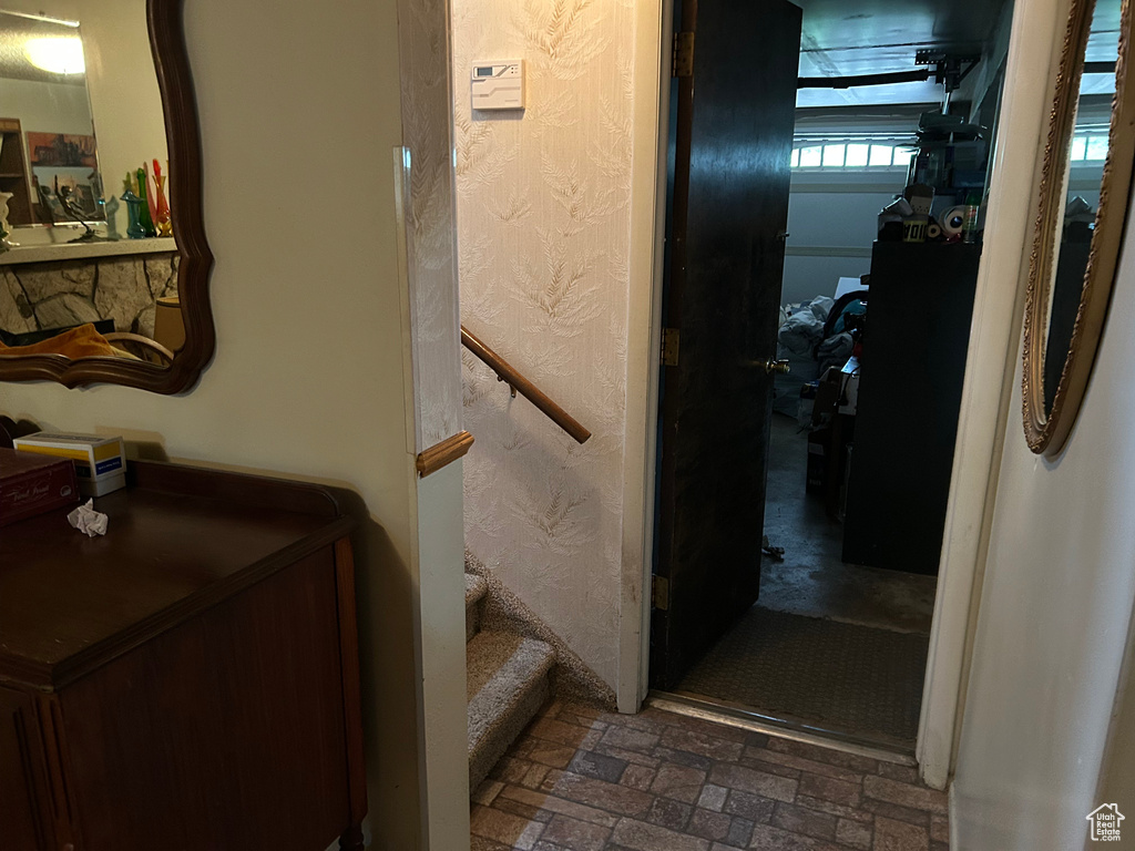 Hallway with brick floor