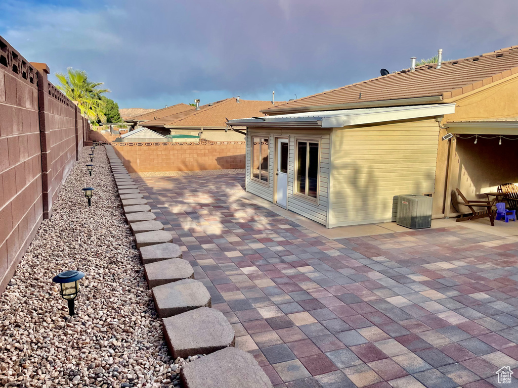View of patio / terrace featuring a fenced backyard and cooling unit
