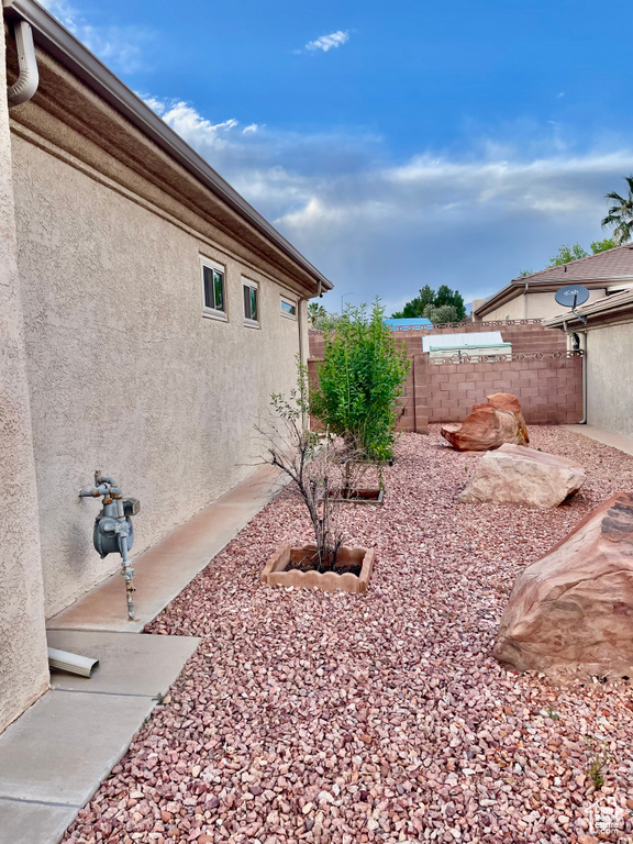 View of fenced backyard