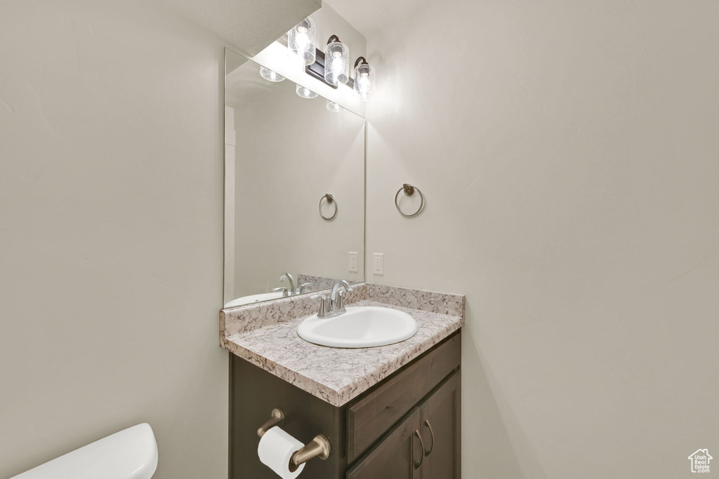 Bathroom featuring toilet and vanity