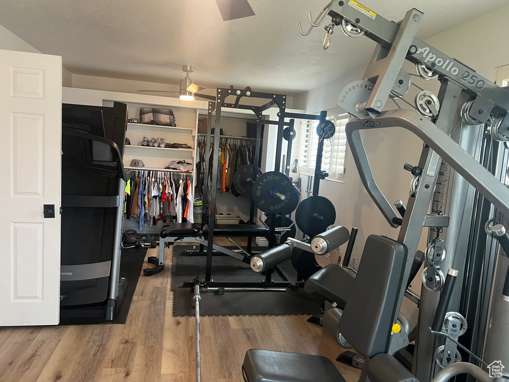 Exercise room with wood finished floors