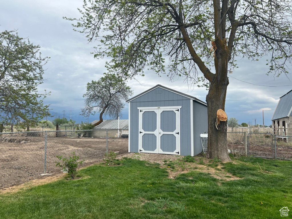 View of shed with fence