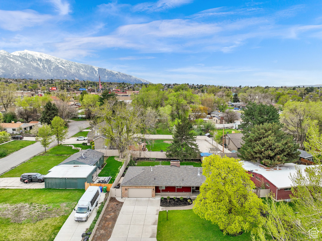 Drone / aerial view with a residential view and a mountain view