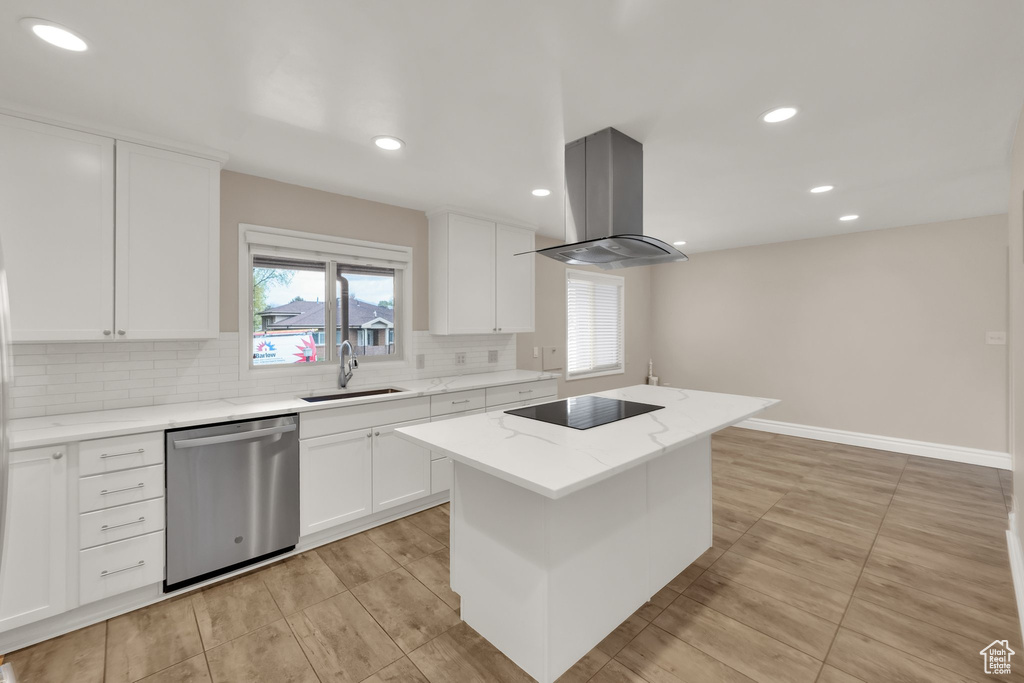 Kitchen with black electric cooktop, island exhaust hood, backsplash, stainless steel dishwasher, and a sink