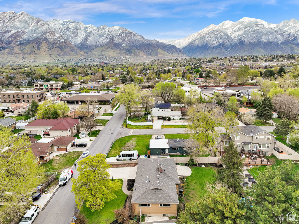 Birds eye view of property featuring a residential view and a mountain view