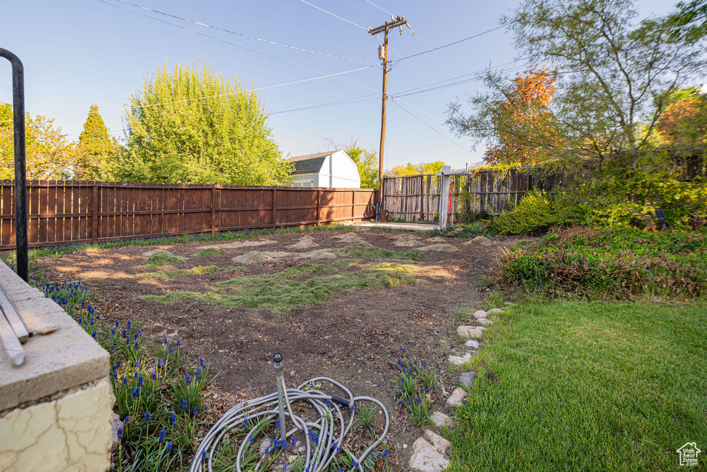 View of yard featuring a fenced backyard