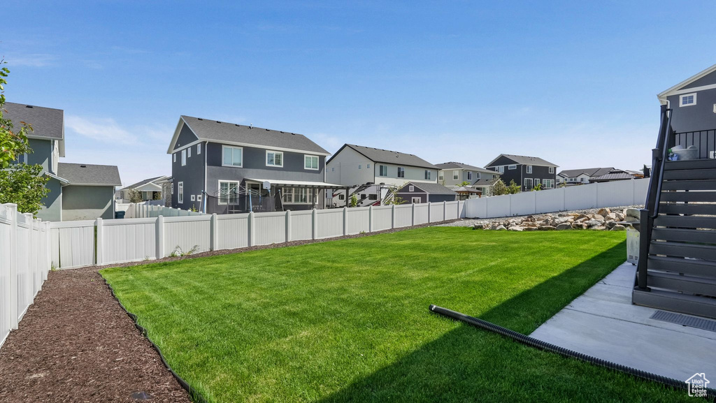 View of yard with a residential view