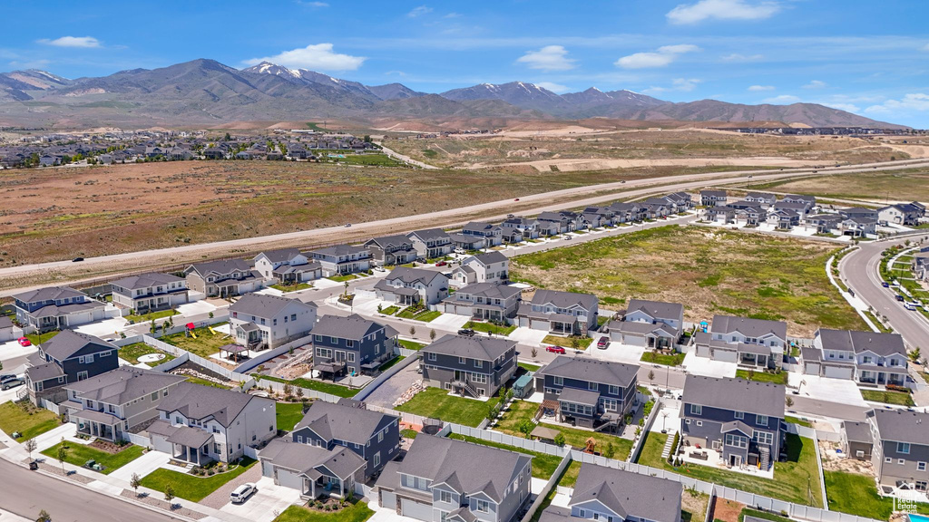 Aerial view of residential area with a mountain backdrop