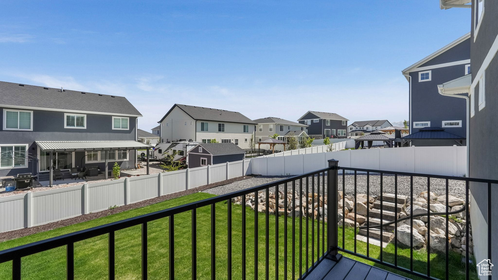 Balcony featuring a residential view