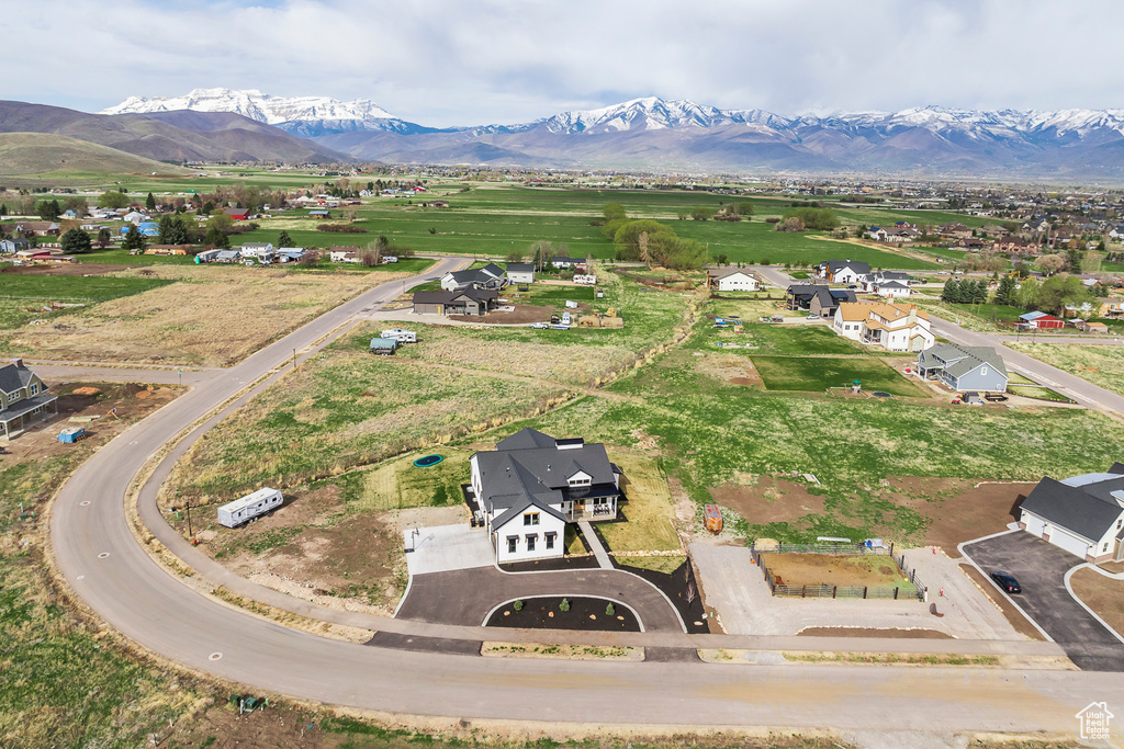 Birds eye view of property featuring a mountain view