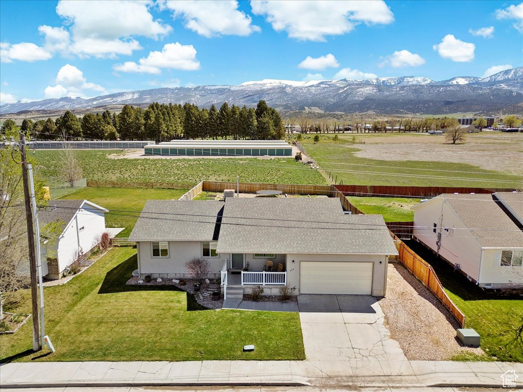 Aerial view with a rural view and a mountain view