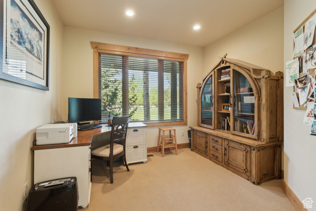 Home office with light carpet, baseboards, and recessed lighting