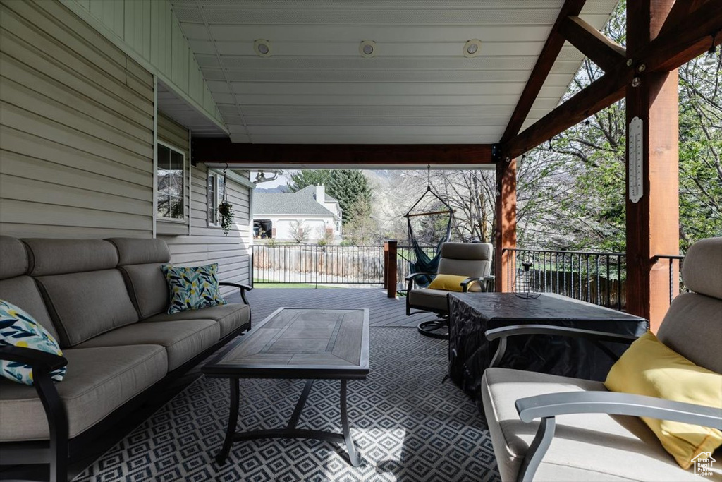 View of patio featuring a deck and an outdoor hangout area