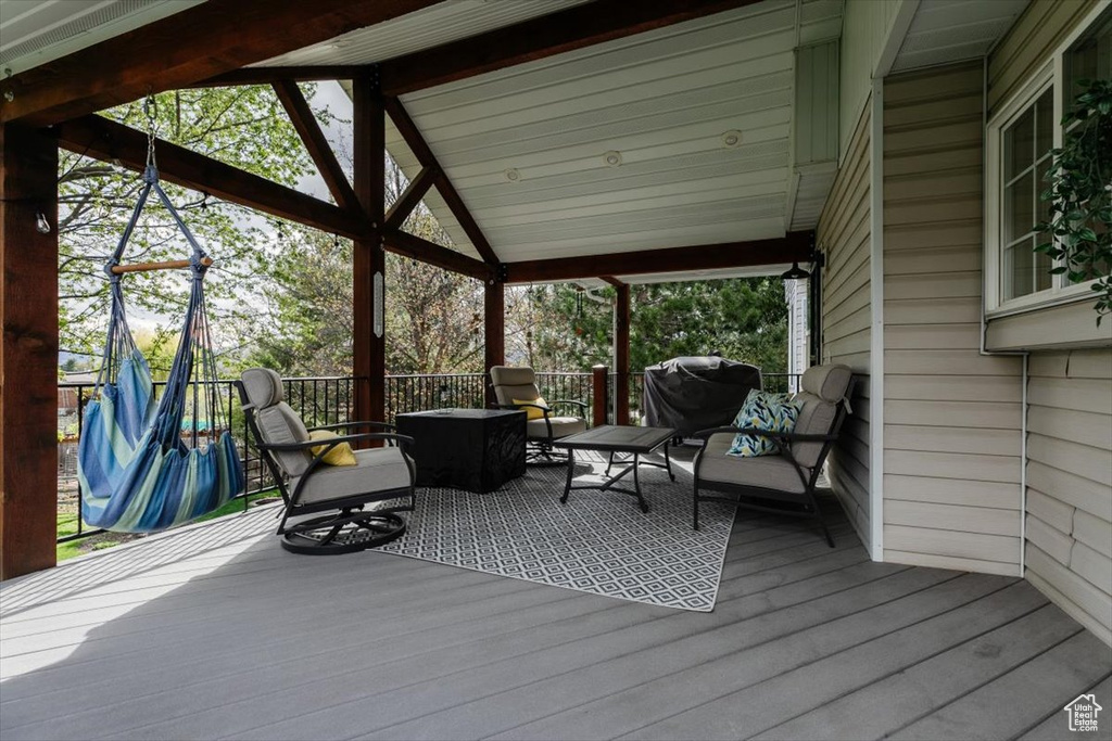 Wooden terrace with outdoor lounge area