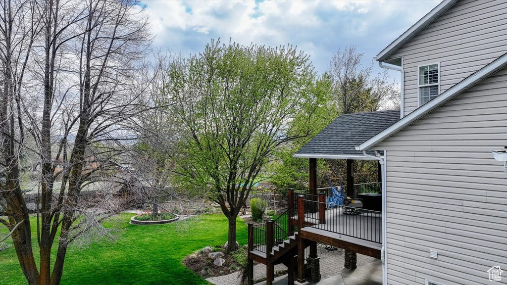 View of yard featuring a deck