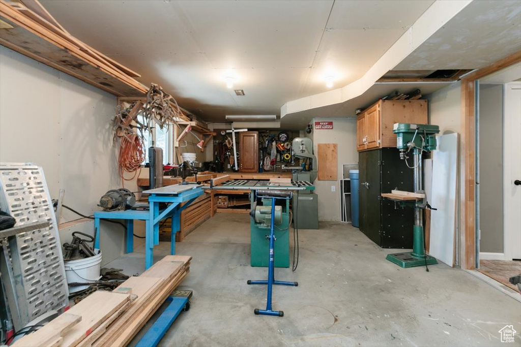 Below grade area featuring a workshop area