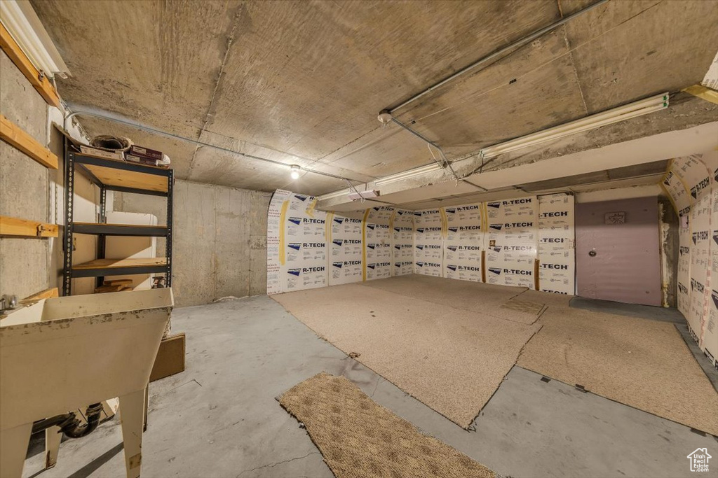 Unfinished below grade area with a sink
