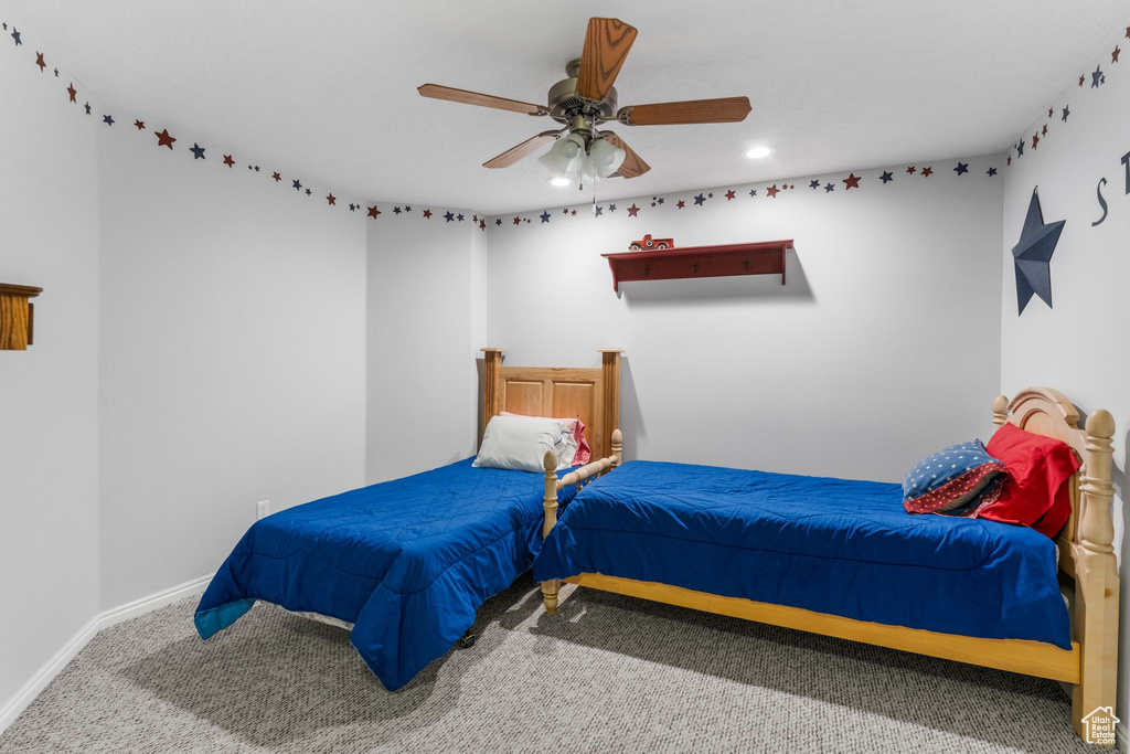 Bedroom featuring baseboards, carpet floors, recessed lighting, and ceiling fan