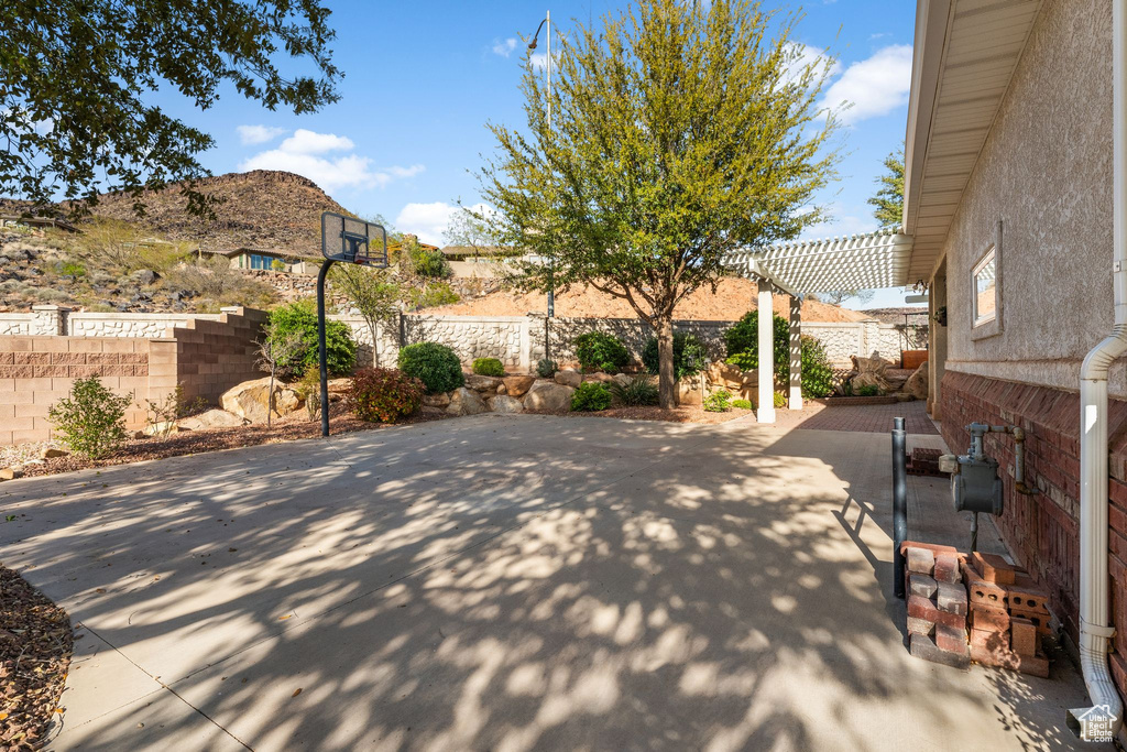 View of patio / terrace with a fenced backyard and a pergola