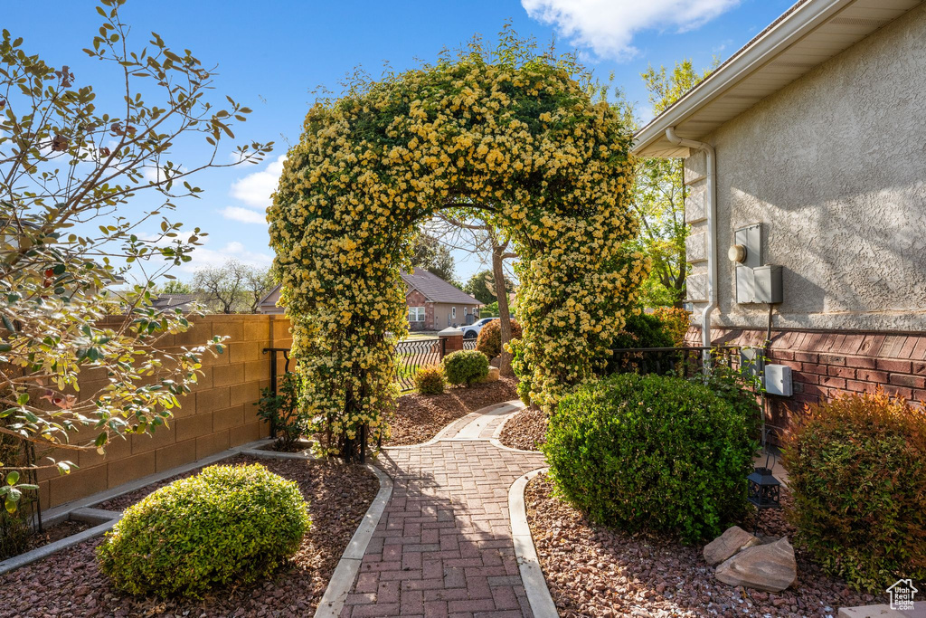 View of yard featuring fence