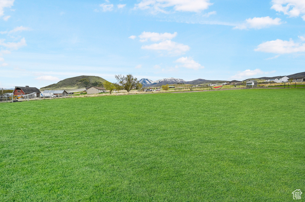 View of yard with a mountain view