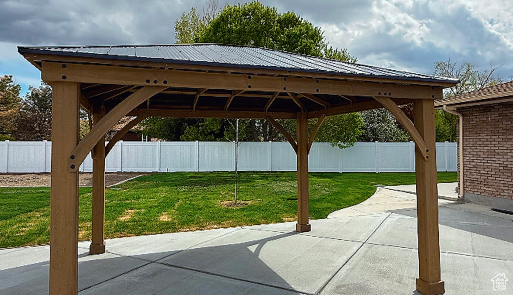 View of patio / terrace with a fenced backyard and a gazebo