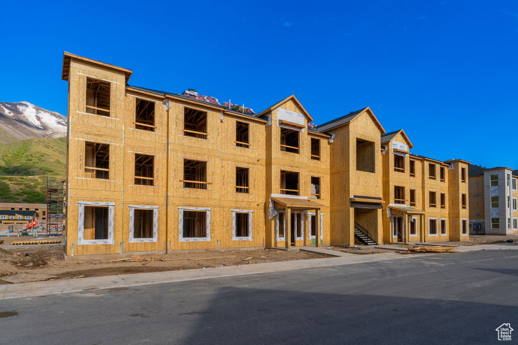 View of building exterior with a mountain view