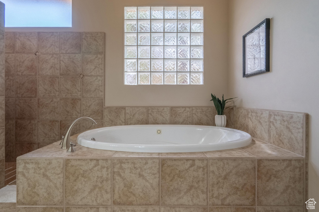 Full bathroom with a garden tub