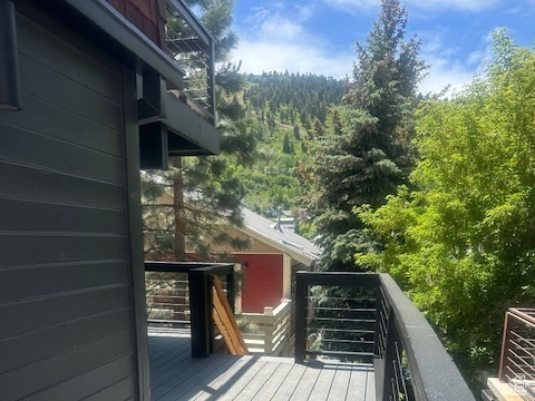 Deck with a view of trees