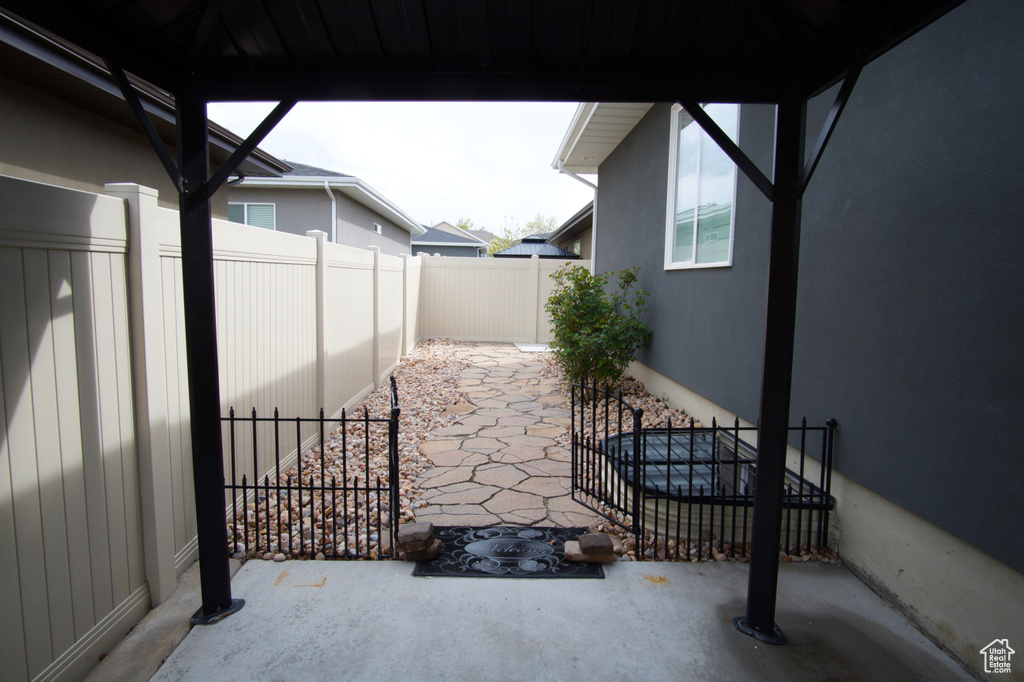 View of patio / terrace featuring a fenced backyard and a gazebo
