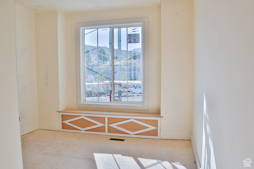 Empty room with baseboards
