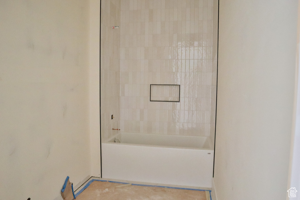 Bathroom featuring shower / bathtub combination