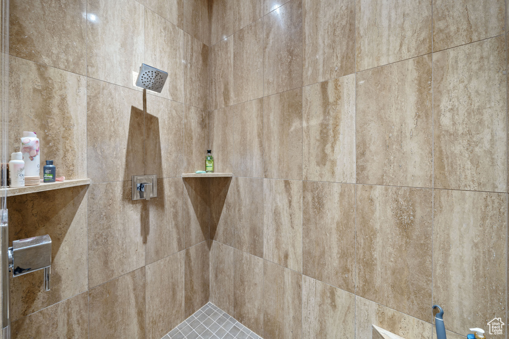 Bathroom with tiled shower