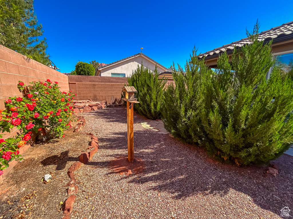 View of yard featuring a fenced backyard