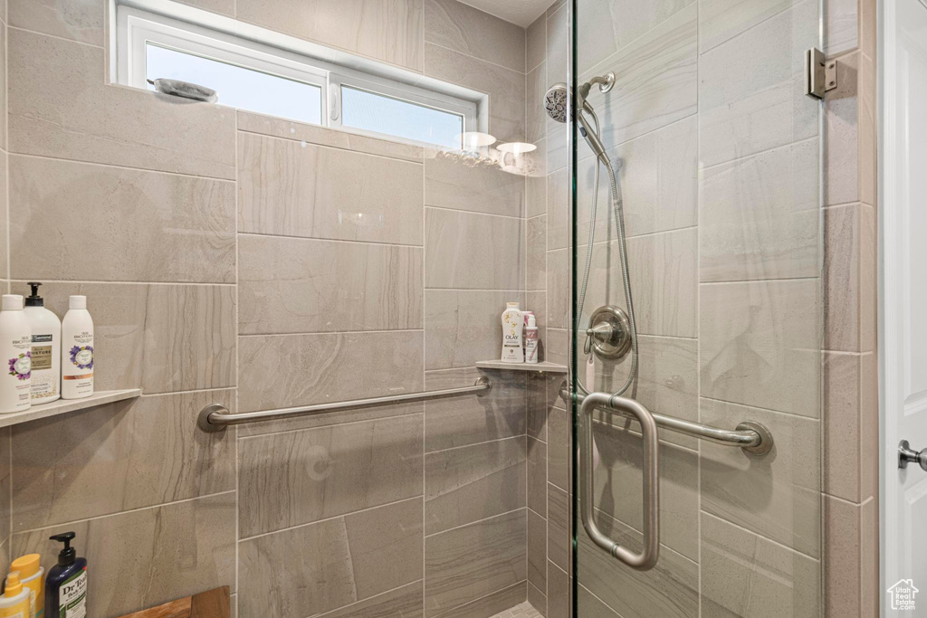 Full bathroom with a stall shower