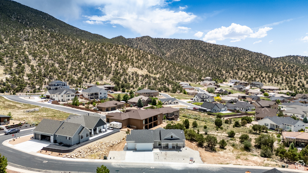 Aerial view of residential area featuring mountains