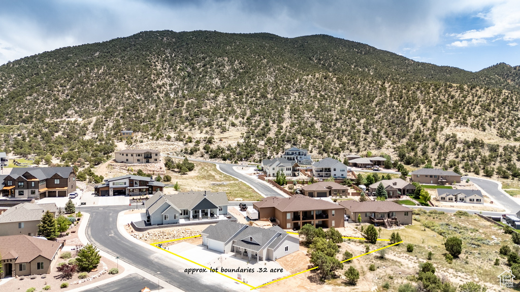 Aerial view of residential area with mountains