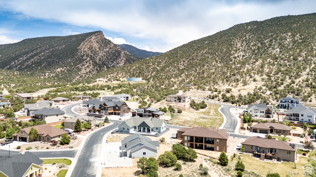 View of mountain background featuring nearby suburban area