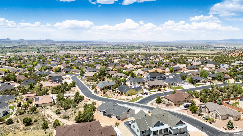 Aerial view of residential area with a mountainous background