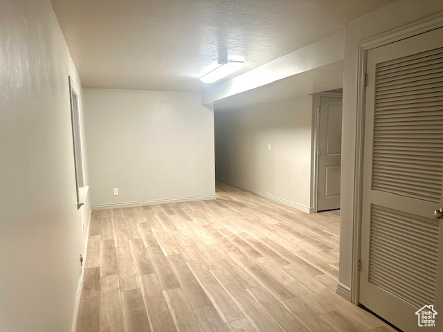 Interior space with light wood finished floors and baseboards