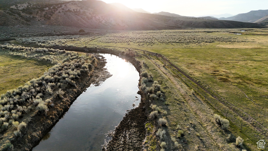 View of rural area featuring a water and mountain view
