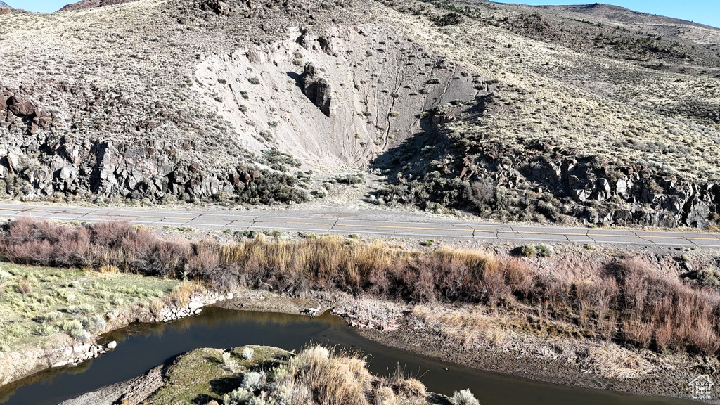 Mountain view with a nearby body of water