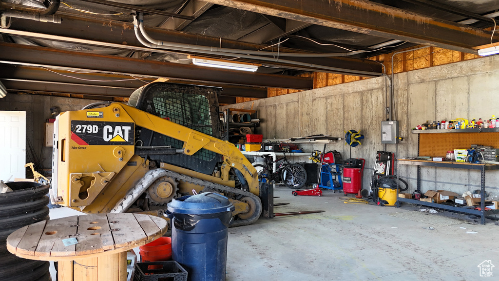 Garage featuring a workshop area