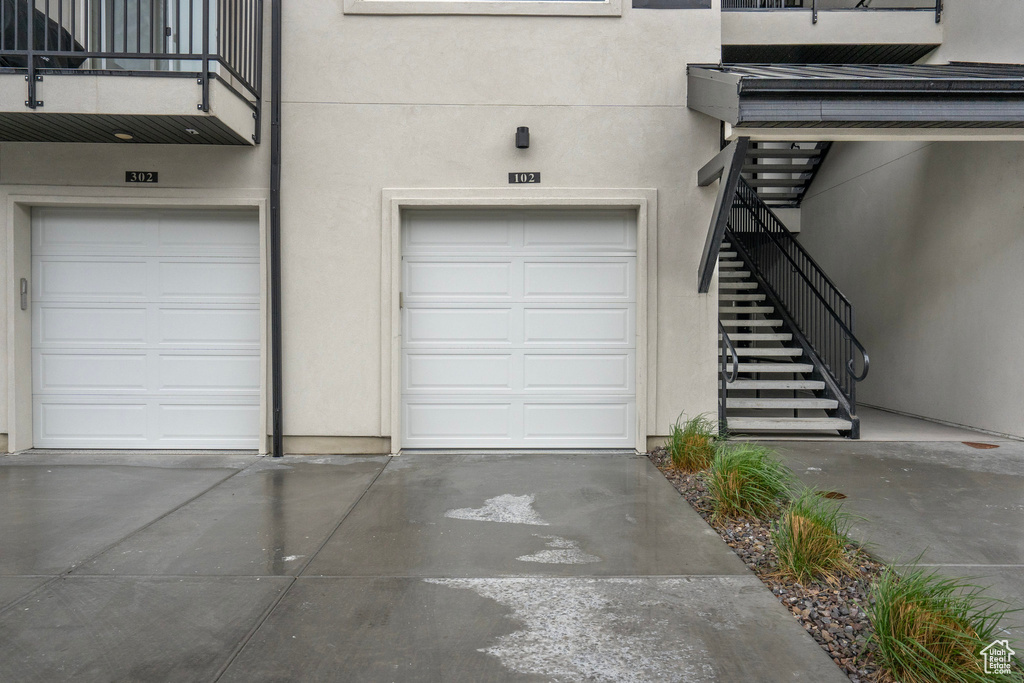Garage featuring driveway