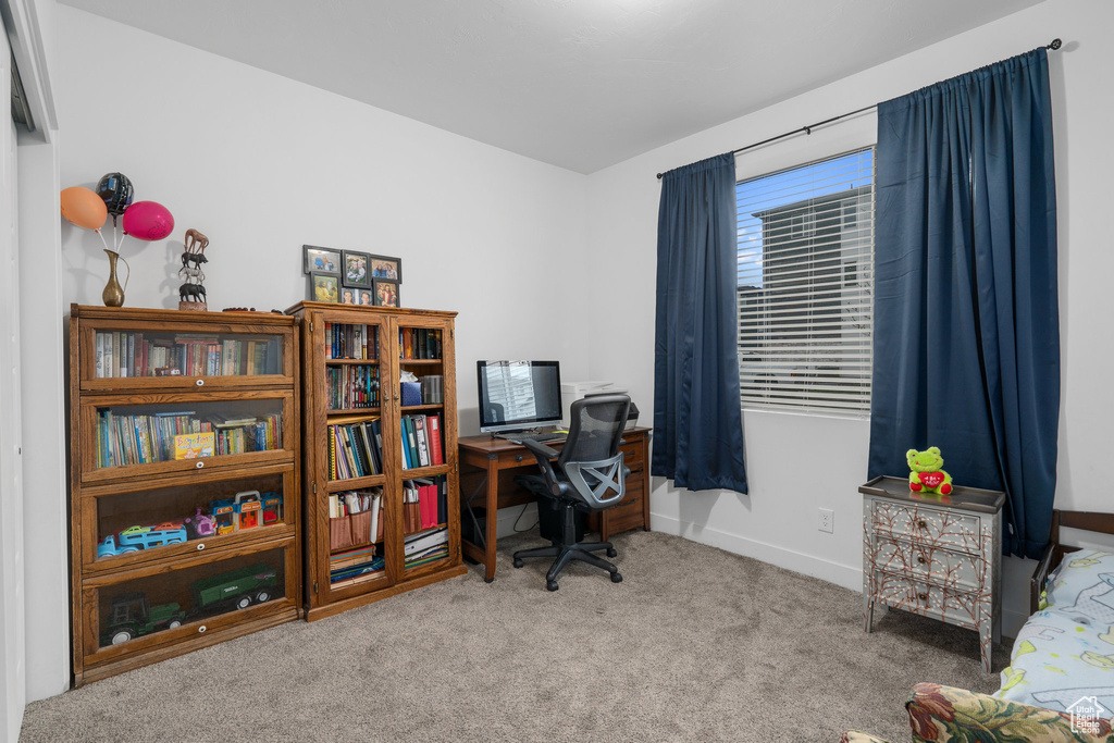 Office featuring carpet floors and baseboards