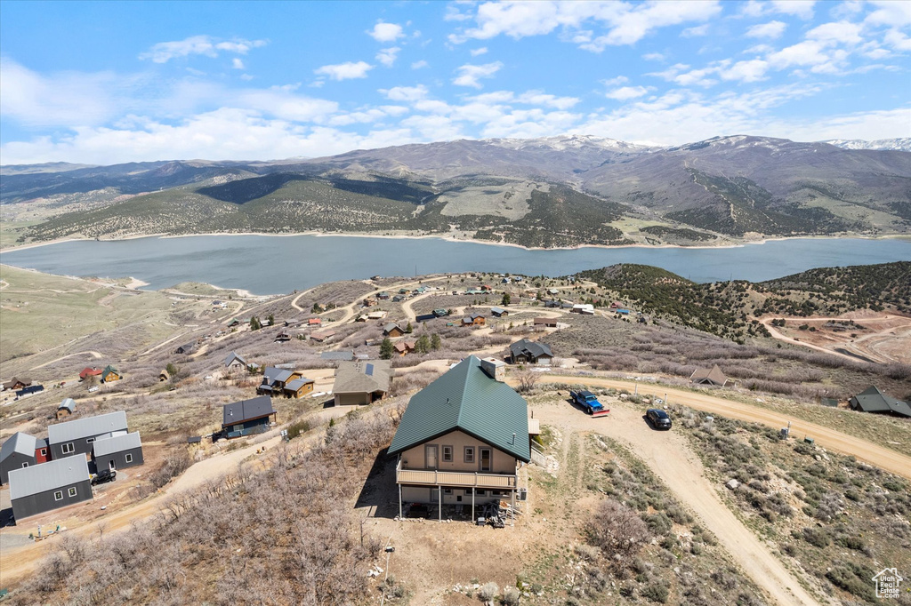 Bird\'s eye view with a water and mountain view