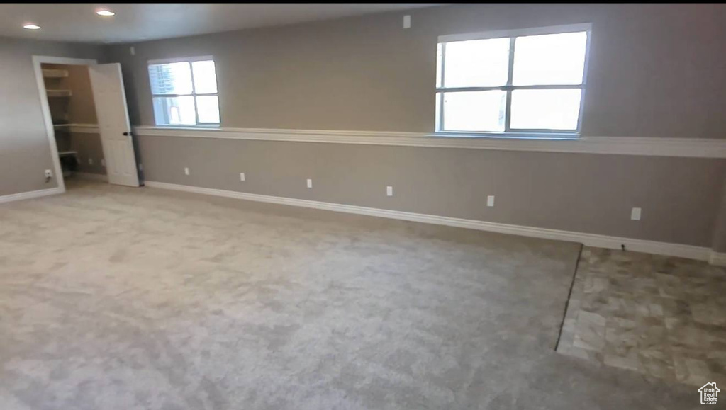 Unfurnished bedroom with baseboards, recessed lighting, and carpet flooring